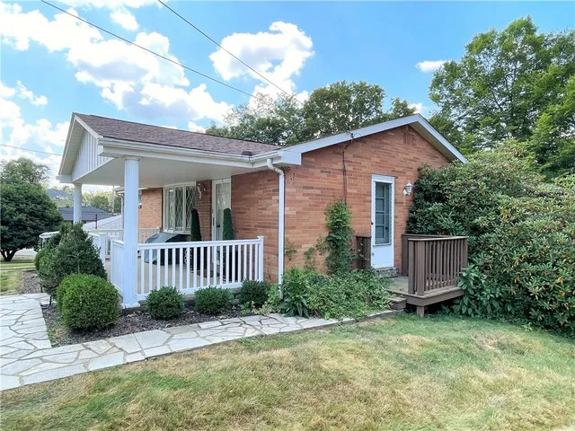 a front view of house with yard