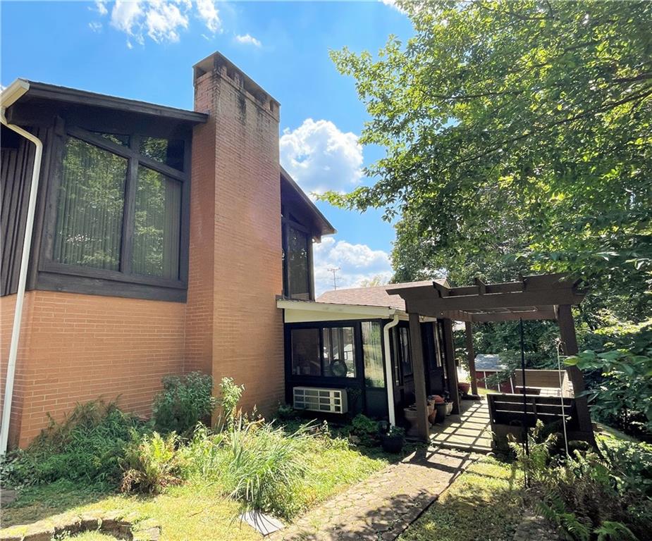 2310 North Forest Grove Road Coraopolis, PA 15108 - Photo 48 of 50 a view of house with backyard space and balcony