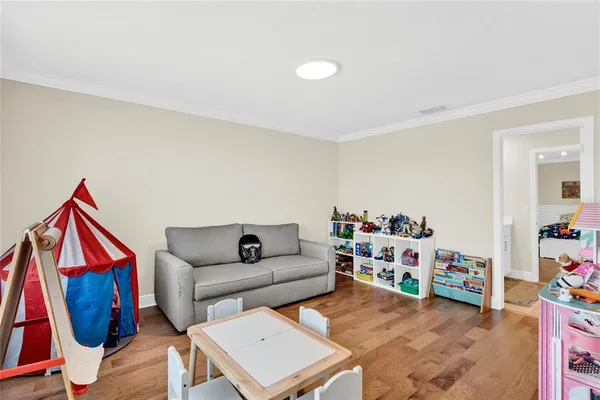 a living room with furniture and a couch