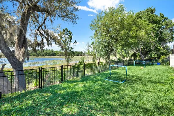 a view of a backyard with a patio