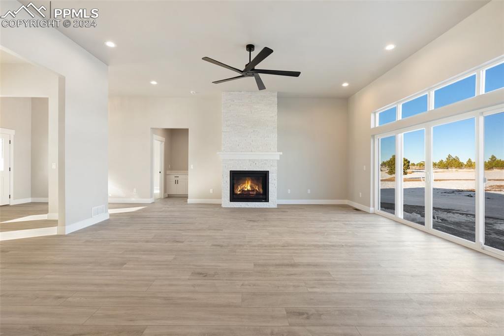 17615 Blacksmith Drive Peyton, CO 80831 - Photo 24 of 41 a view of a livingroom with a ceiling fan and window