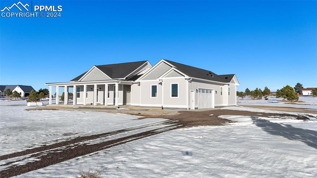17615 Blacksmith Drive Peyton, CO 80831 - Photo 3 of 41 a view of front of house with a yard