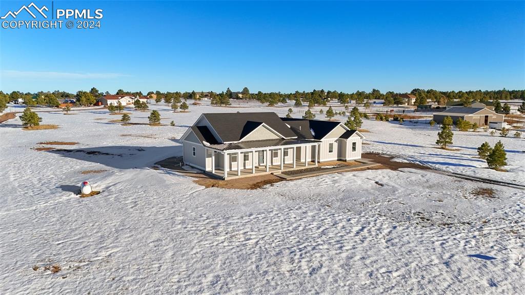 17615 Blacksmith Drive Peyton, CO 80831 - Photo 36 of 41 a view of a terrace with chairs