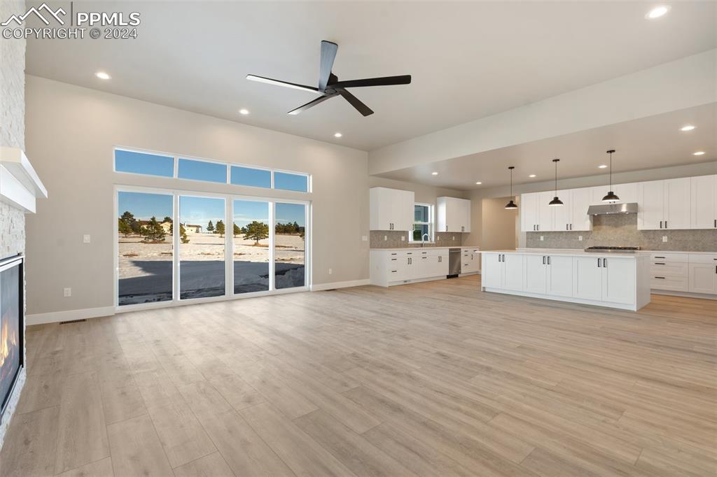 17615 Blacksmith Drive Peyton, CO 80831 - Photo 8 of 41 a view of a kitchen with furniture and a window