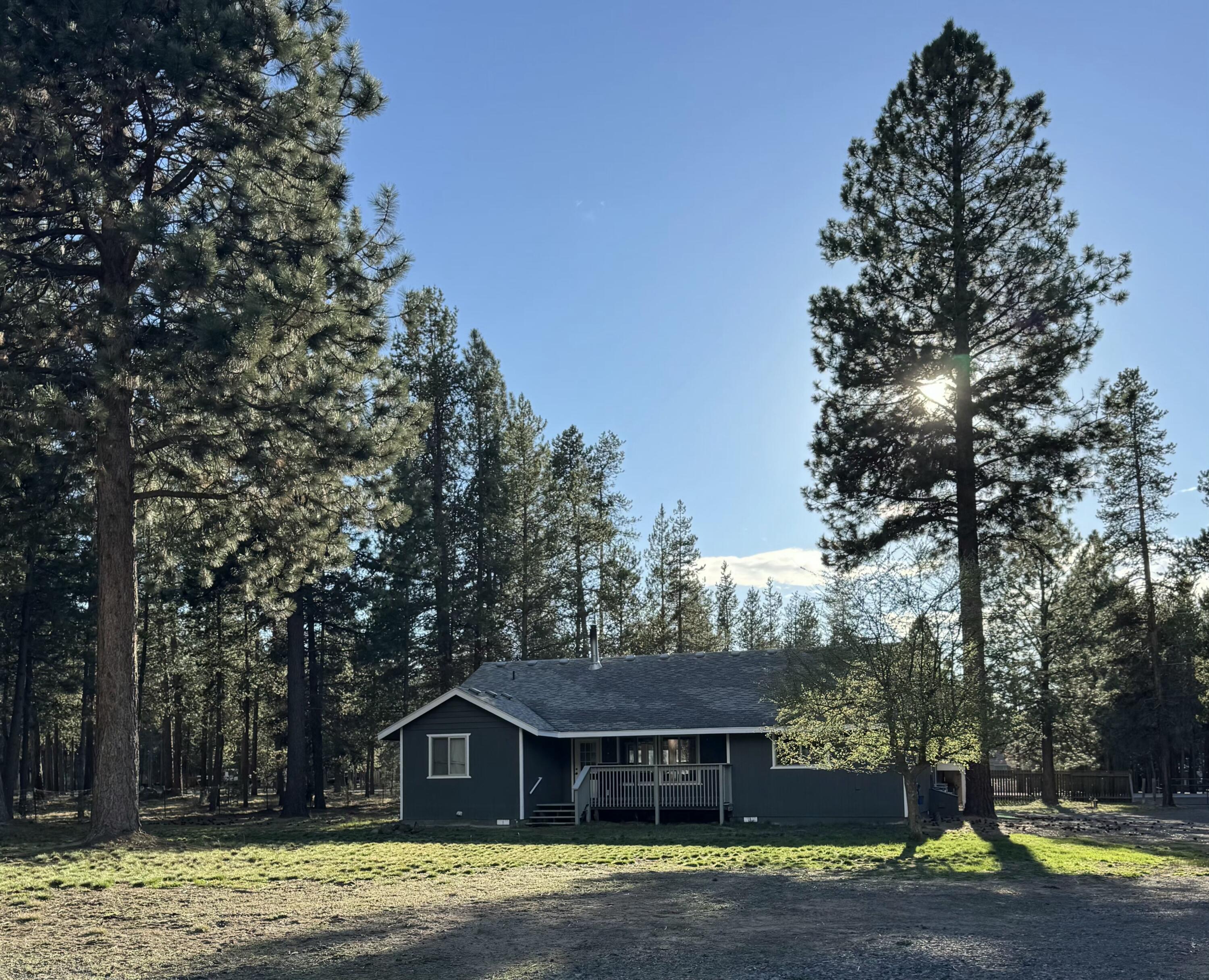 53156 Day Road La Pine, OR 97739 - Photo 4 of 28 surrounded by tall pines..back of home view.