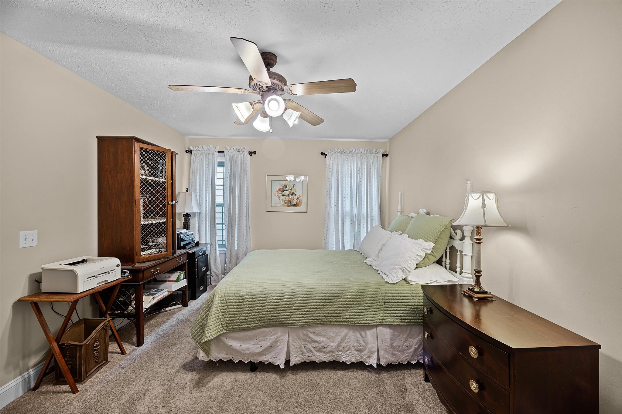 40 Vantage Pointe Counce, TN 38326 - Photo 13 of 25 a bedroom with a bed and a chandelier