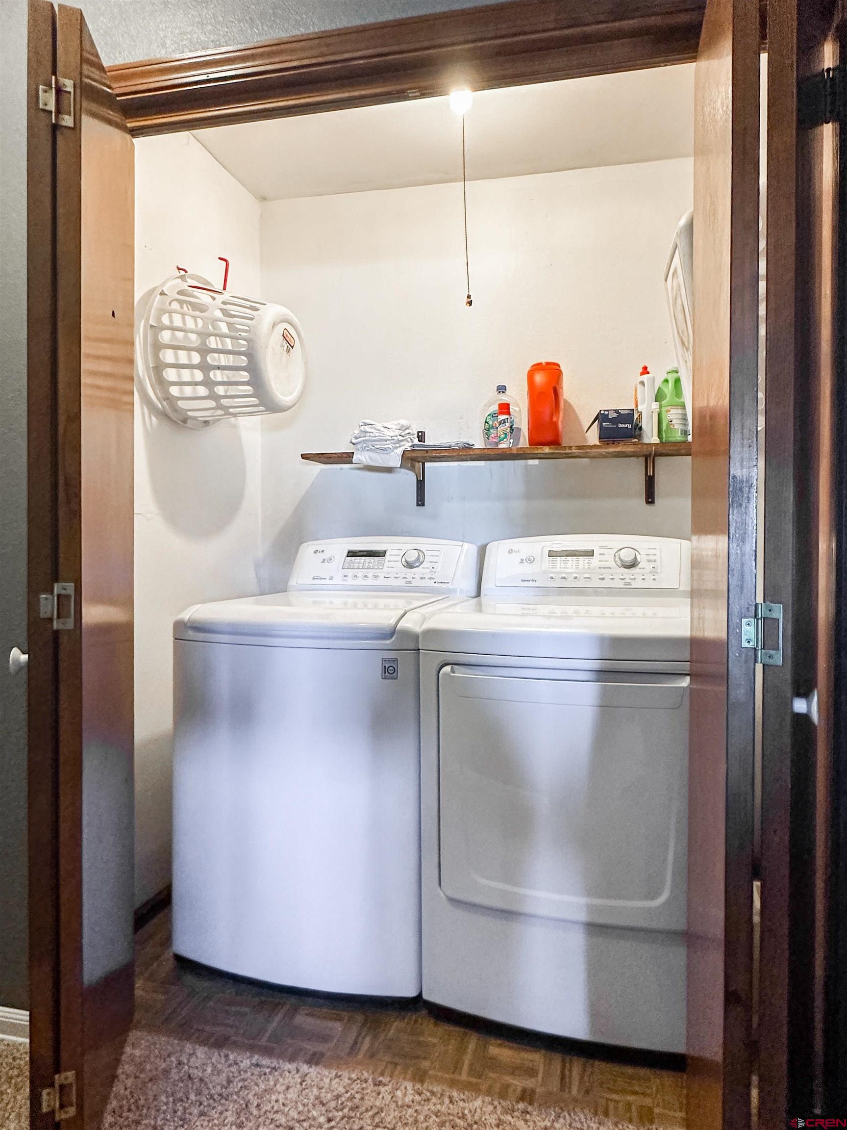 18555 F Road Delta, CO 81416 - Photo 26 of 43 a utility room with dryer and washer