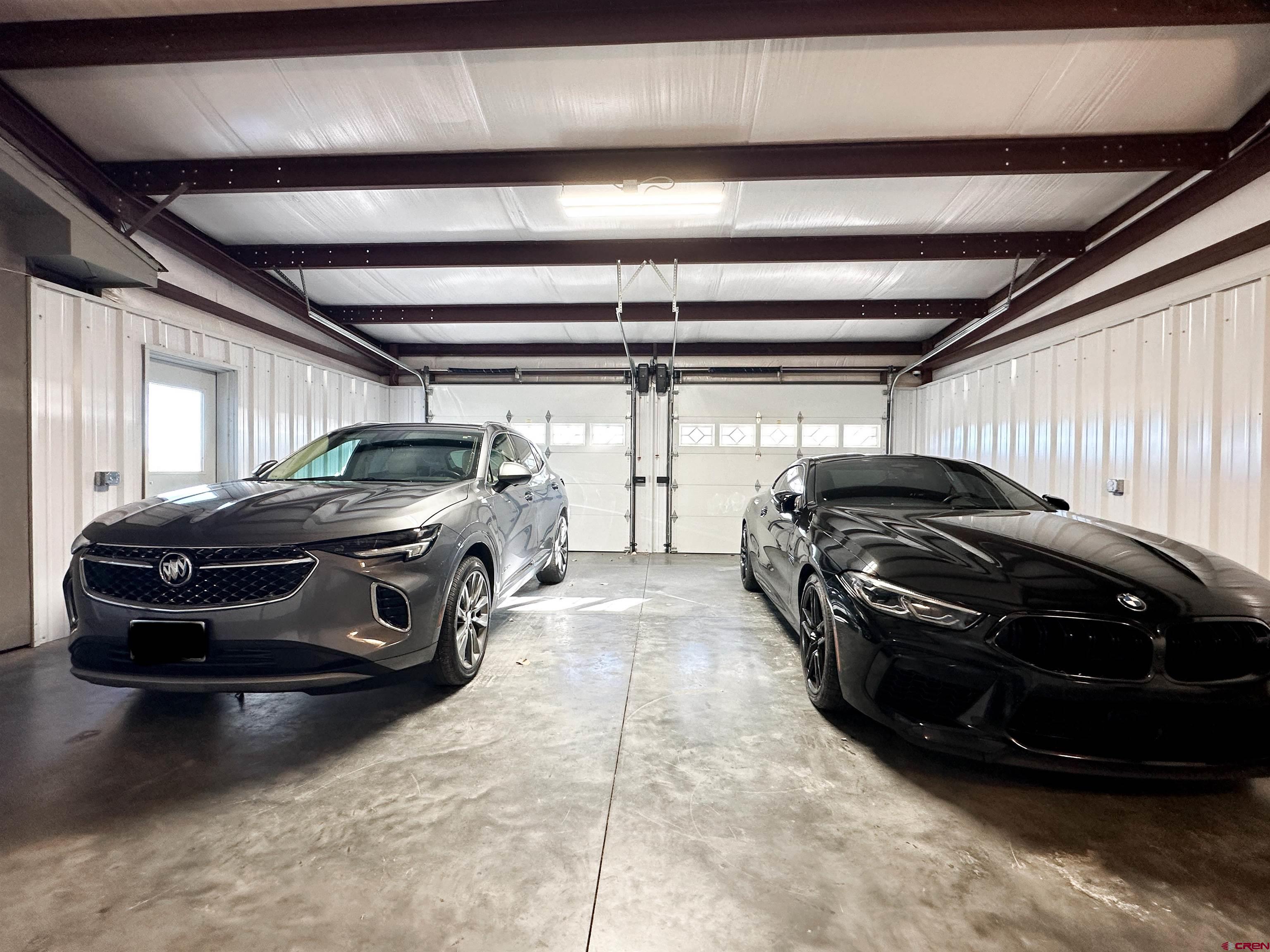 18555 F Road Delta, CO 81416 - Photo 38 of 43 a car parked in a garage
