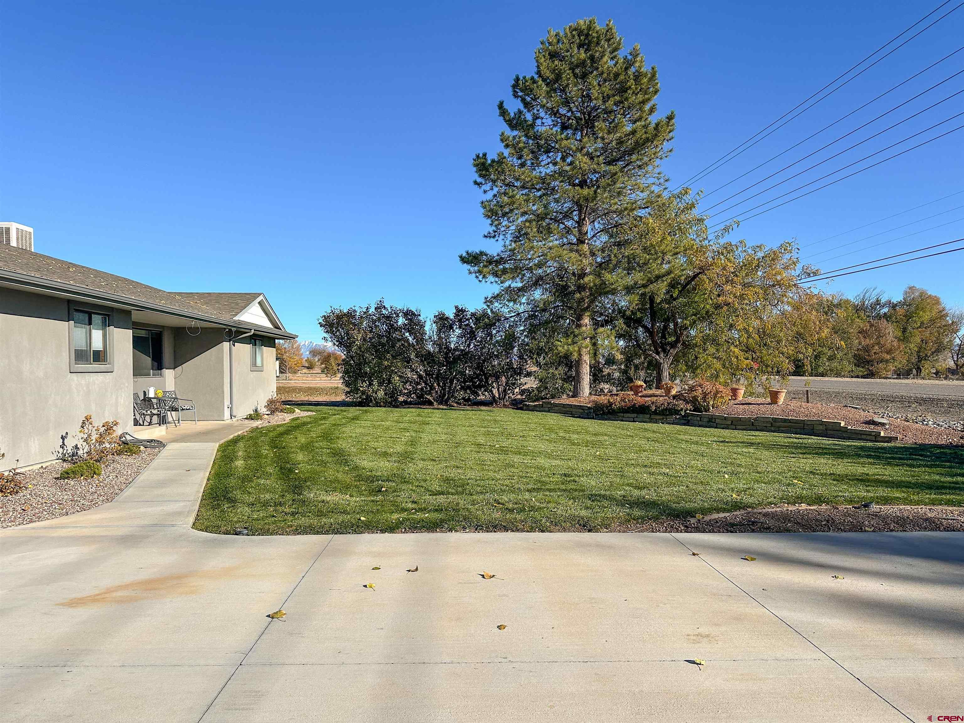 18555 F Road Delta, CO 81416 - Photo 5 of 43 a view of a house with a garden