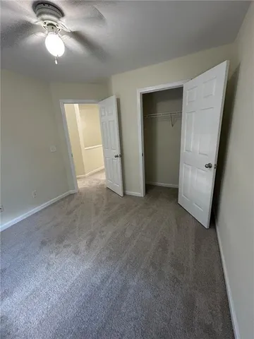 an empty room with a bathroom