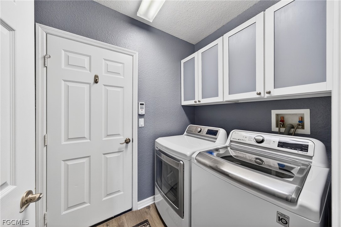 8313 Sumner Avenue Fort Myers, FL 33908 - Photo 28 of 42 a utility room with dryer and washer