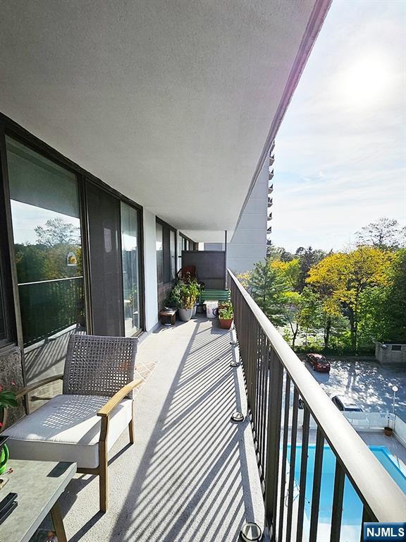 277 Prospect Avenue, Unit 4H Hackensack, NJ 07601 - Photo 17 of 19 a view of balcony with furniture