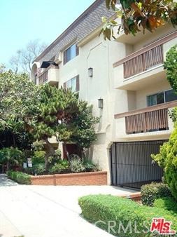 3111 4th Street, Unit 309 Santa Monica, CA 90405 - Photo 1 of 10 a view of a house with a garden and pathway
