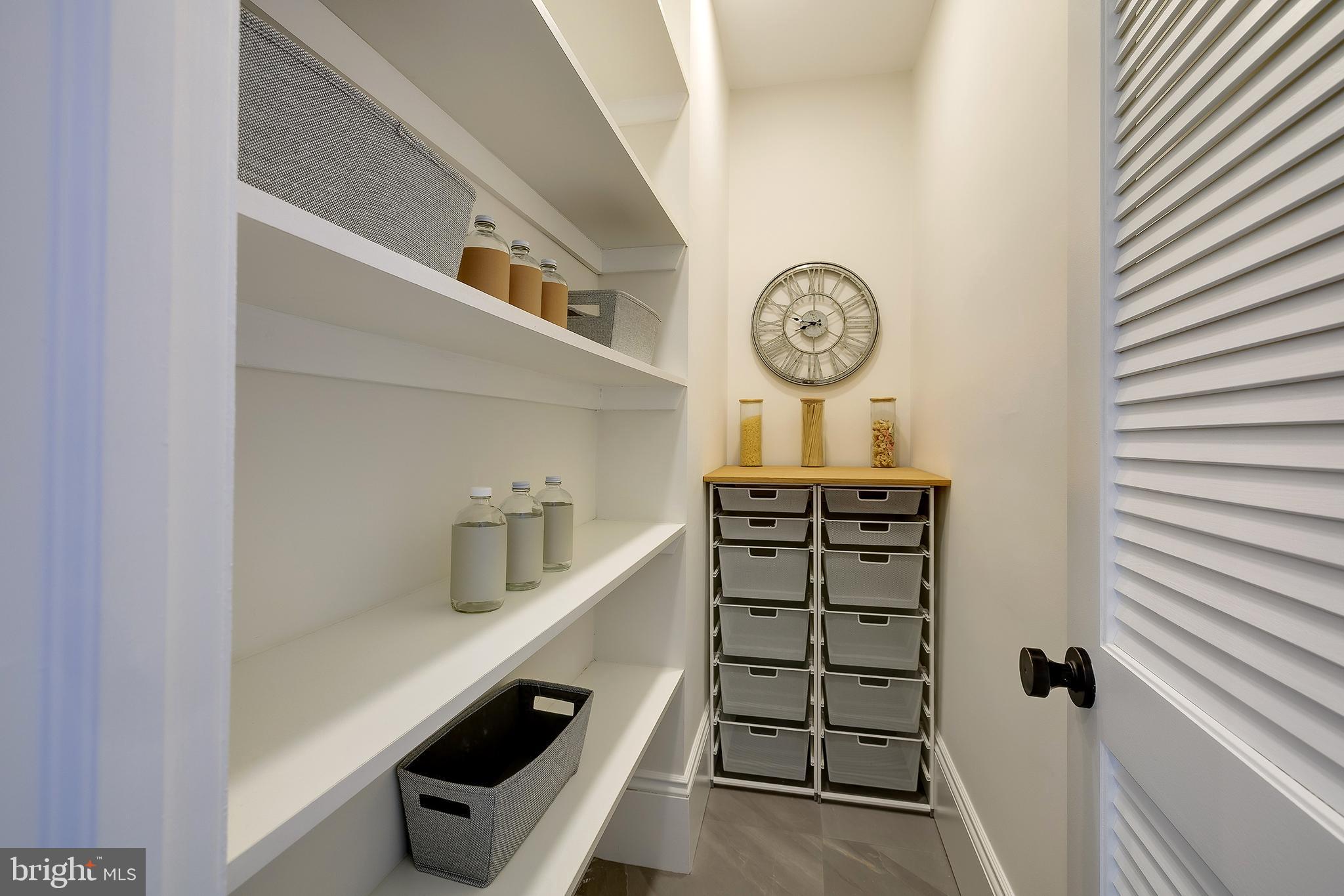 2853 Ontario Road Northwest, Unit 316 Washington, DC 20009 - Photo 25 of 42 a view of a hallway with seating area
