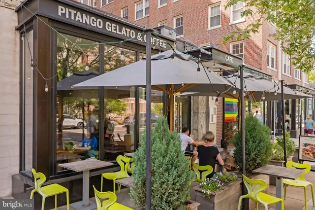 a view of an outdoor sitting area with a table and chairs