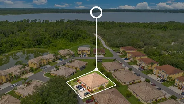 an aerial view of a house with a garden