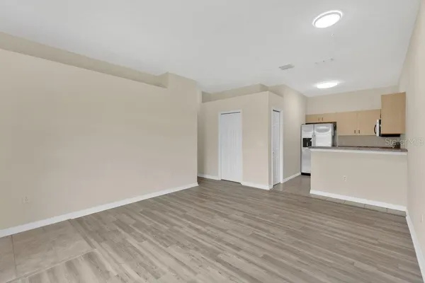 a view of kitchen with wooden floor