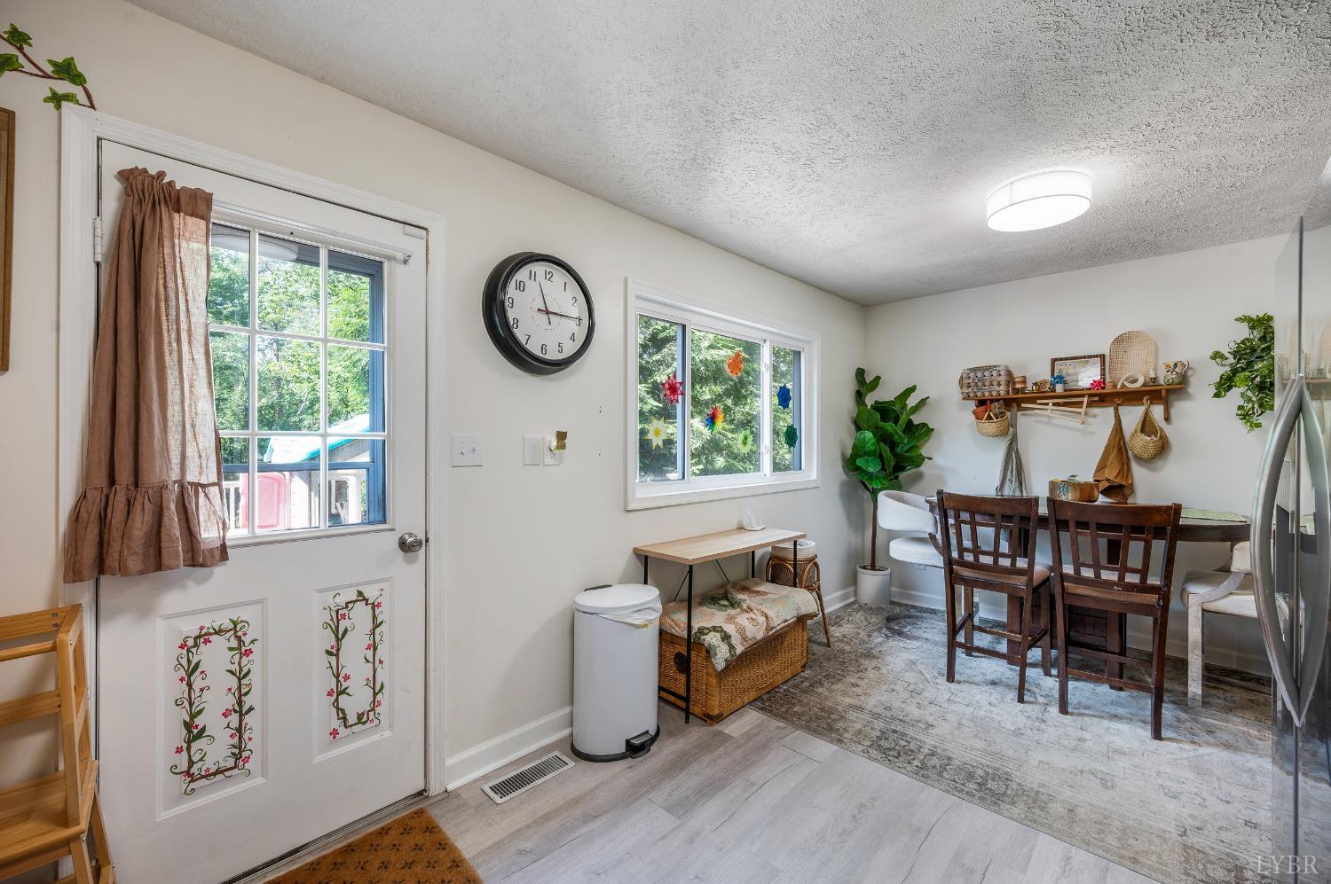 778 Doss Road Concord, VA 24538 - Photo 9 of 42 a view of a dining room with furniture window and outside view