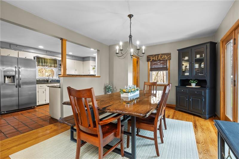 100 Daugherty Road Grove City, PA 16127 - Photo 11 of 48 a view of a dining room with furniture and wooden floor