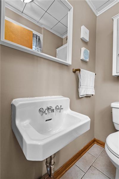 100 Daugherty Road Grove City, PA 16127 - Photo 14 of 48 a bathroom with a sink a toilet and a mirror