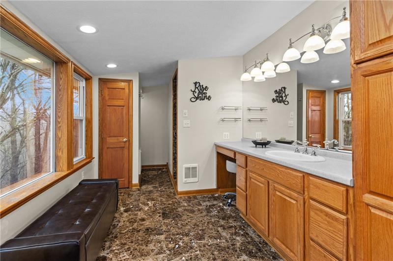 100 Daugherty Road Grove City, PA 16127 - Photo 25 of 48 a spacious bathroom with a double vanity sink a mirror a and a shower