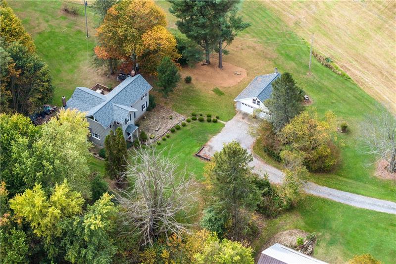 100 Daugherty Road Grove City, PA 16127 - Photo 3 of 48 an aerial view of a house with a yard