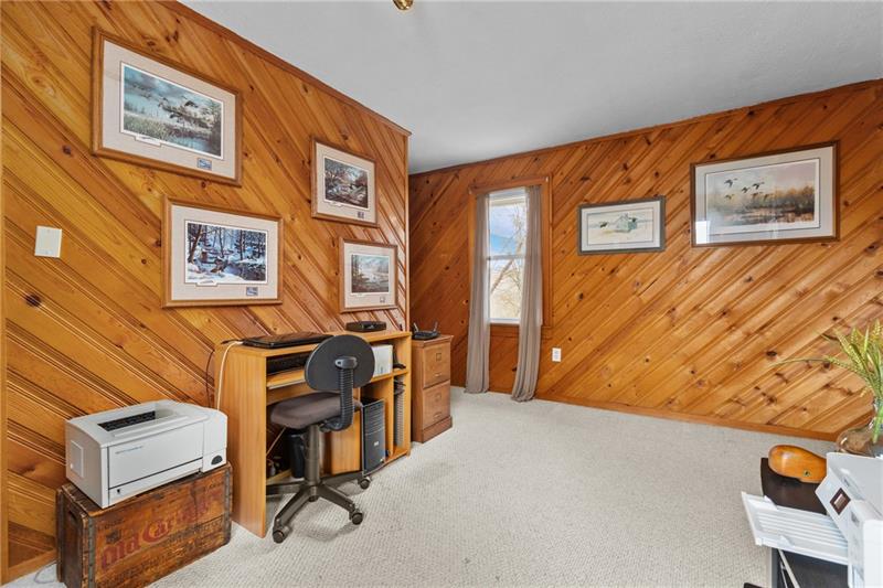 100 Daugherty Road Grove City, PA 16127 - Photo 35 of 48 a bed room with a bed and a desk