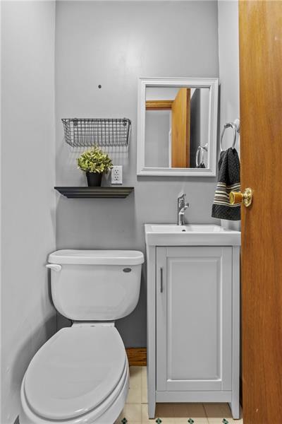 100 Daugherty Road Grove City, PA 16127 - Photo 36 of 48 a bathroom with a toilet sink and mirror
