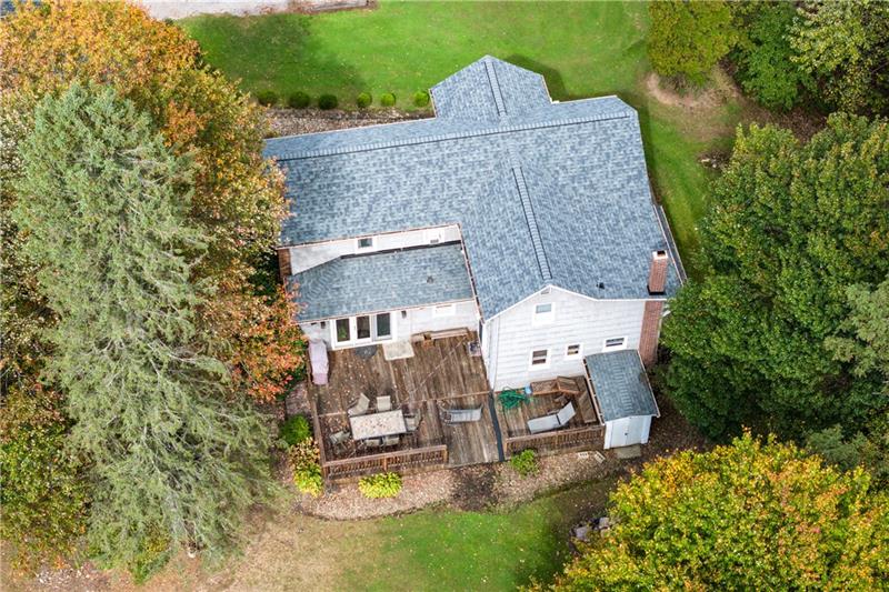 100 Daugherty Road Grove City, PA 16127 - Photo 39 of 48 an aerial view of a house with outdoor space and trees all around