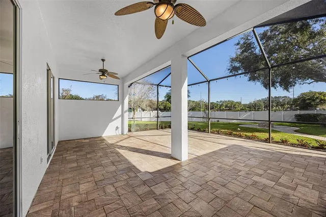 a view of a lake with houses in the back