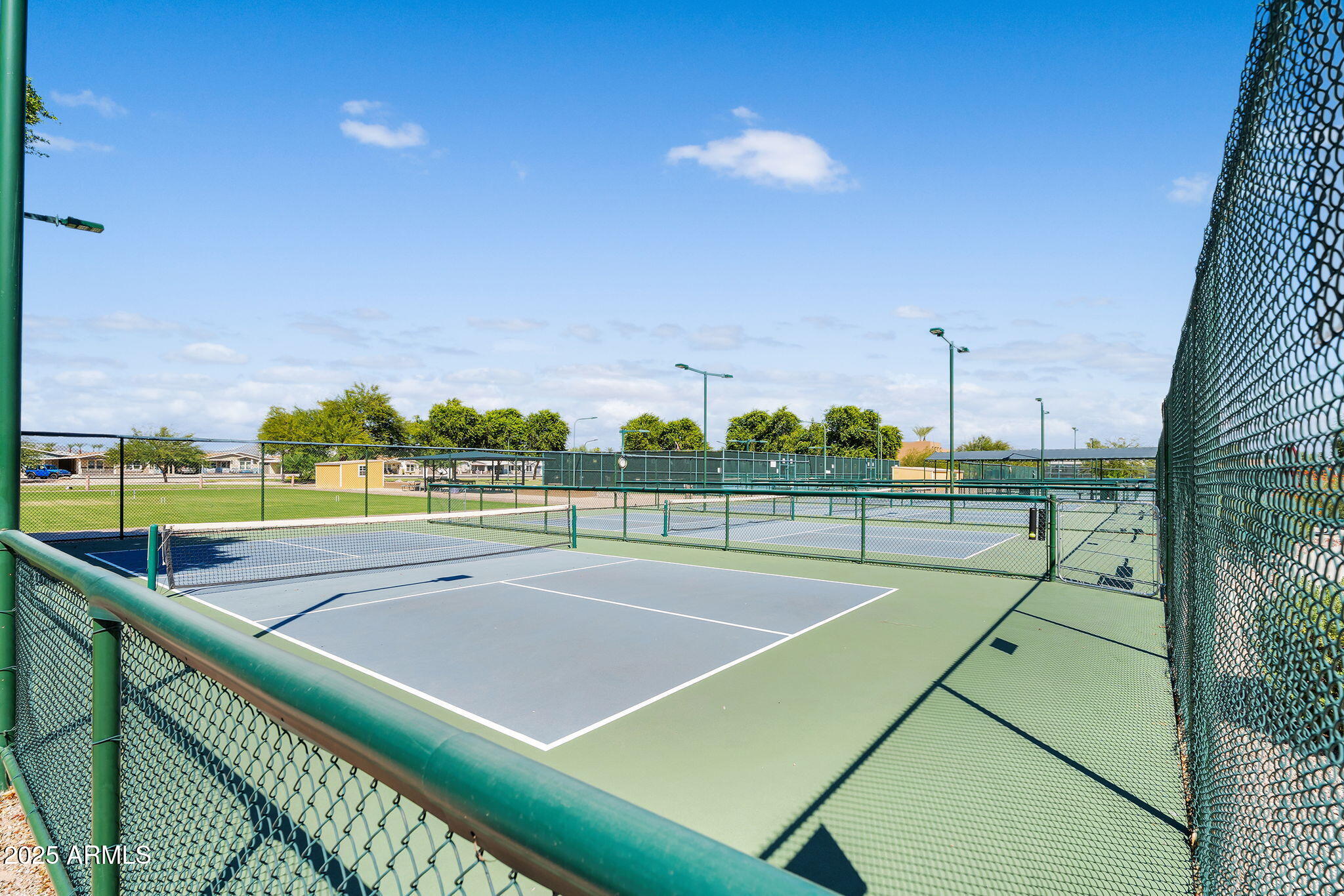 8865 East Baseline Road, Unit 802 Mesa, AZ 85209 - Photo 24 of 44 a view of a tennis court