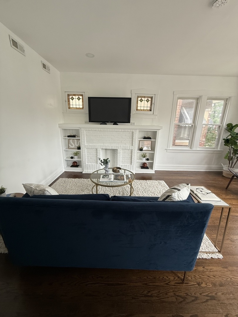 5092 West Monroe Street, Unit 1 Chicago, IL 60644 - Photo 3 of 12 a bathroom with a sink and a mirror