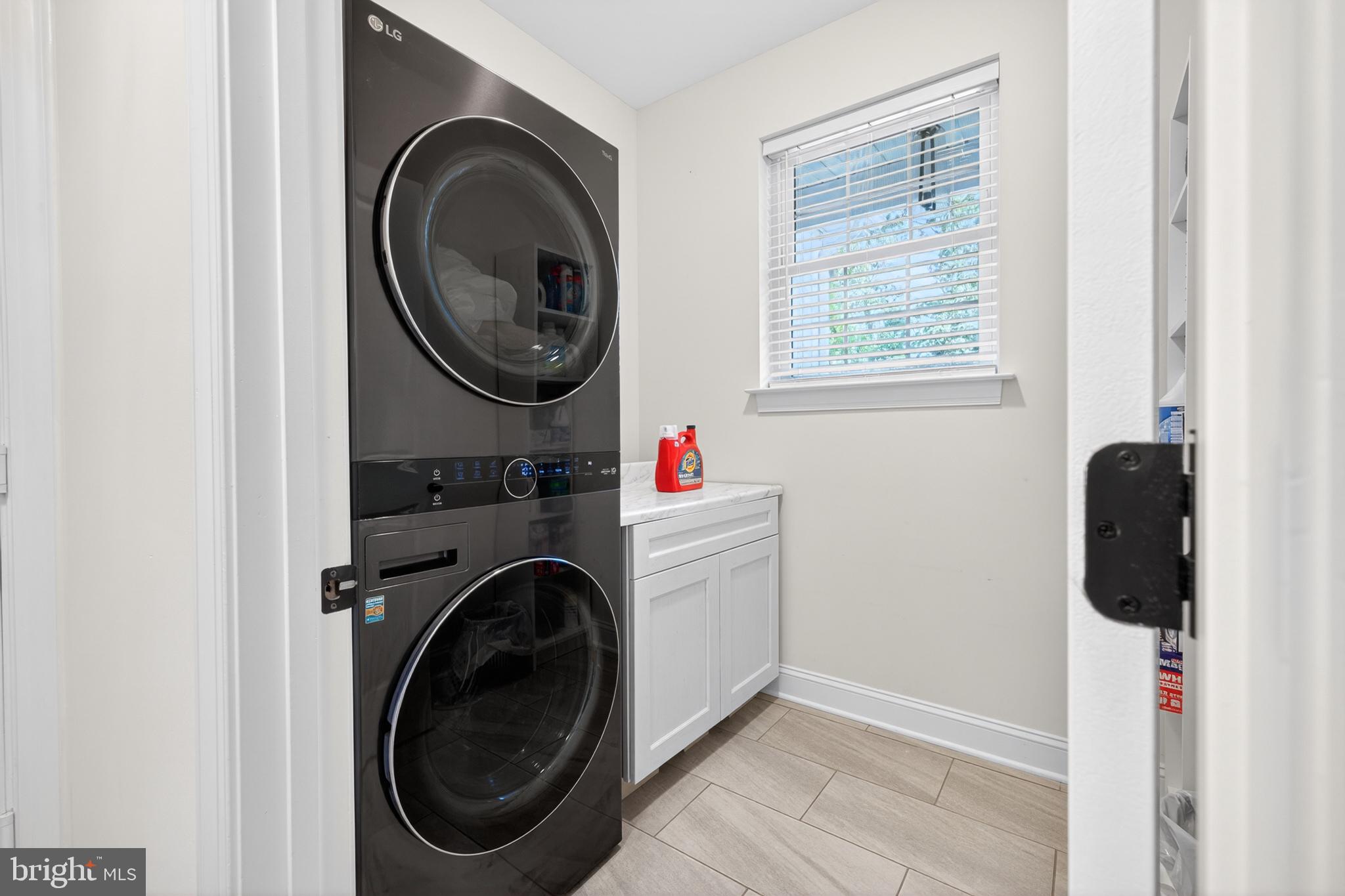 2623 Pike Creek Road Wilmington, DE 19808 - Photo 66 of 66 Sleek laundry space with modern appliances.