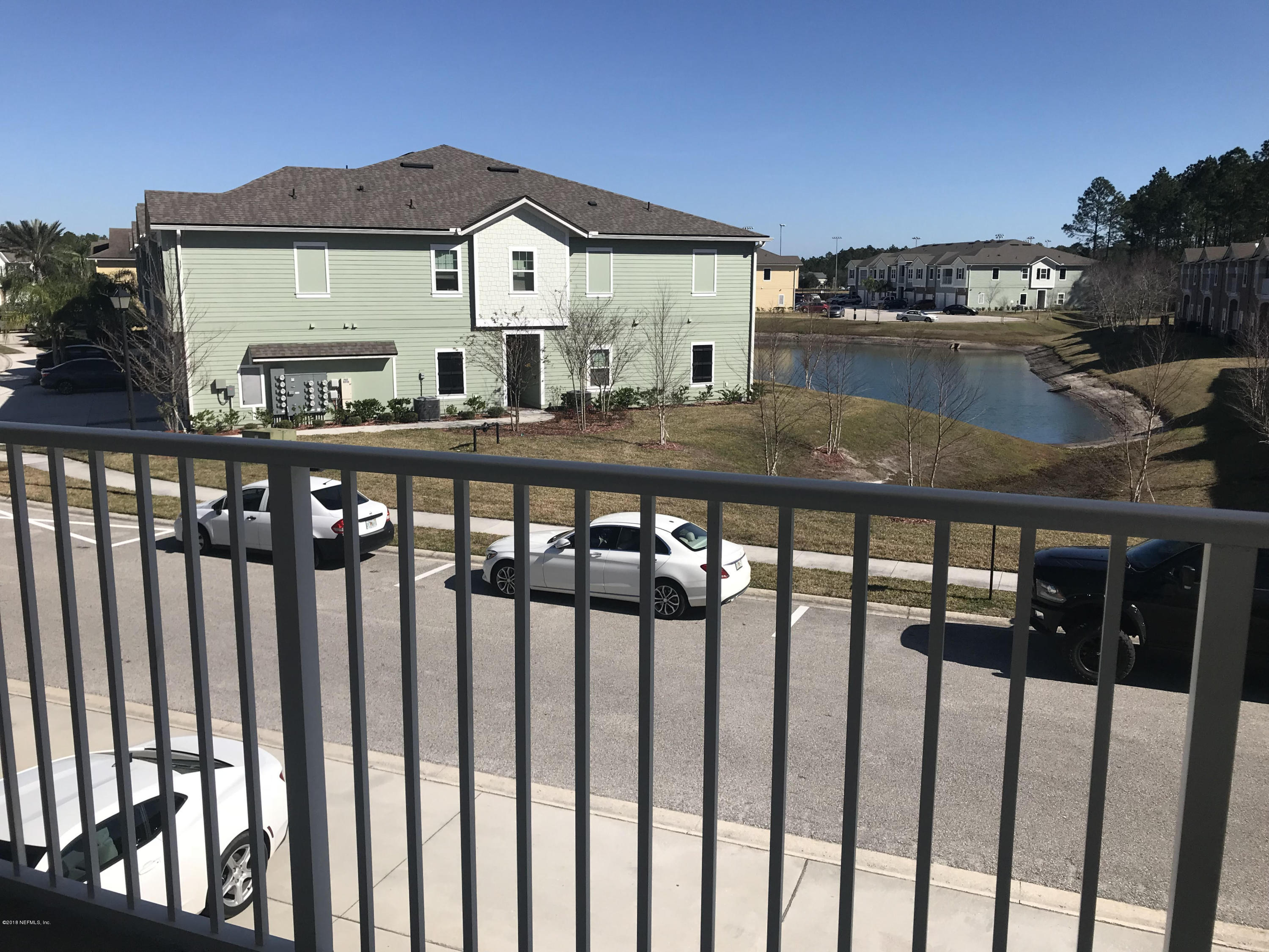 218 Larkin Place, Unit 111 St. Johns, FL 32259 - Photo 15 of 21 a view of a street from a balcony