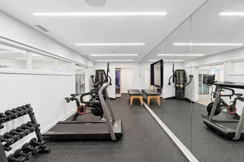 a view of a room with gym equipment