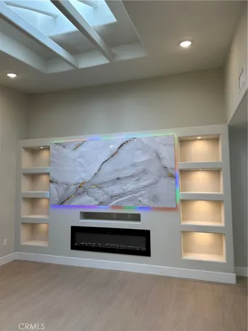 a kitchen with a sink and a refrigerator