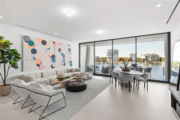 a large kitchen with a large window and counter space