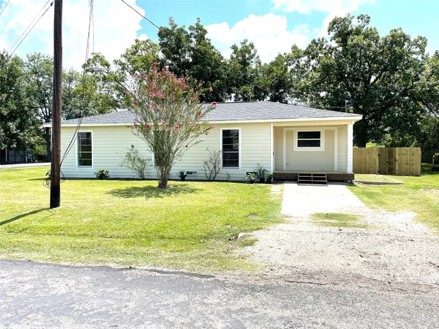 a view of a house with a swimming pool
