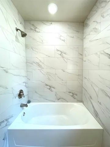 a bathroom with a bathtub