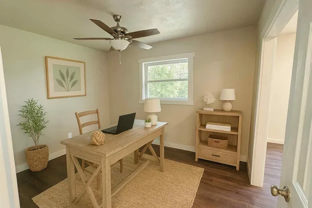 a workspace with furniture and window