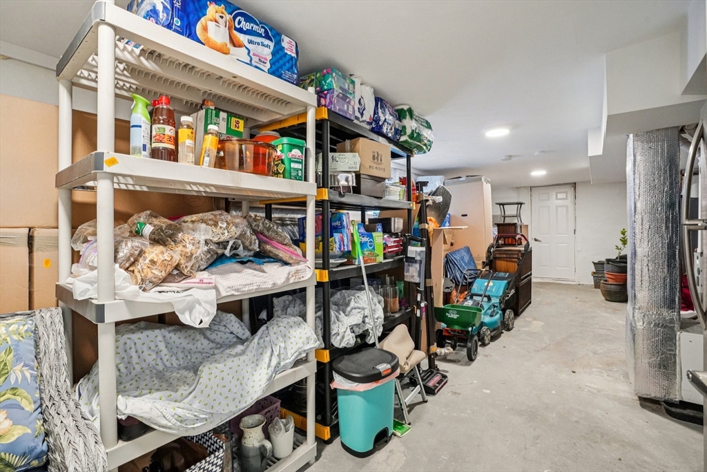 33 Slade Street, Unit 1 Belmont, MA 02478 - Photo 19 of 26 a view of living room filled with furniture and furniture