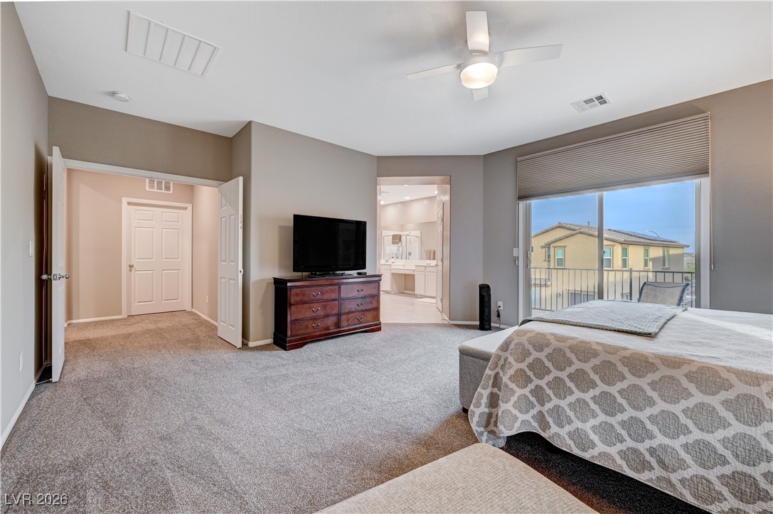 3826 Asia Road North Las Vegas, NV 89032 - Photo 20 of 30 Primary bedroom suite with walk-in closet, access to outside, a ceiling fan, and primary bathroom