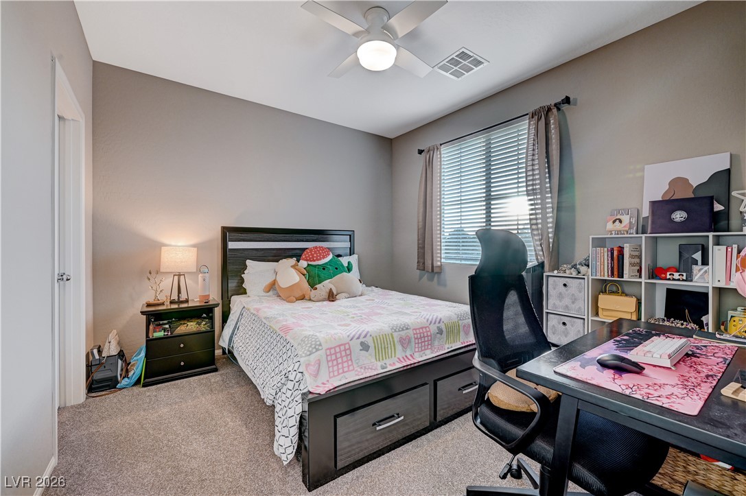 3826 Asia Road North Las Vegas, NV 89032 - Photo 23 of 30 2nd carpeted upstairs bedroom with walk-in closet and ceiling fan