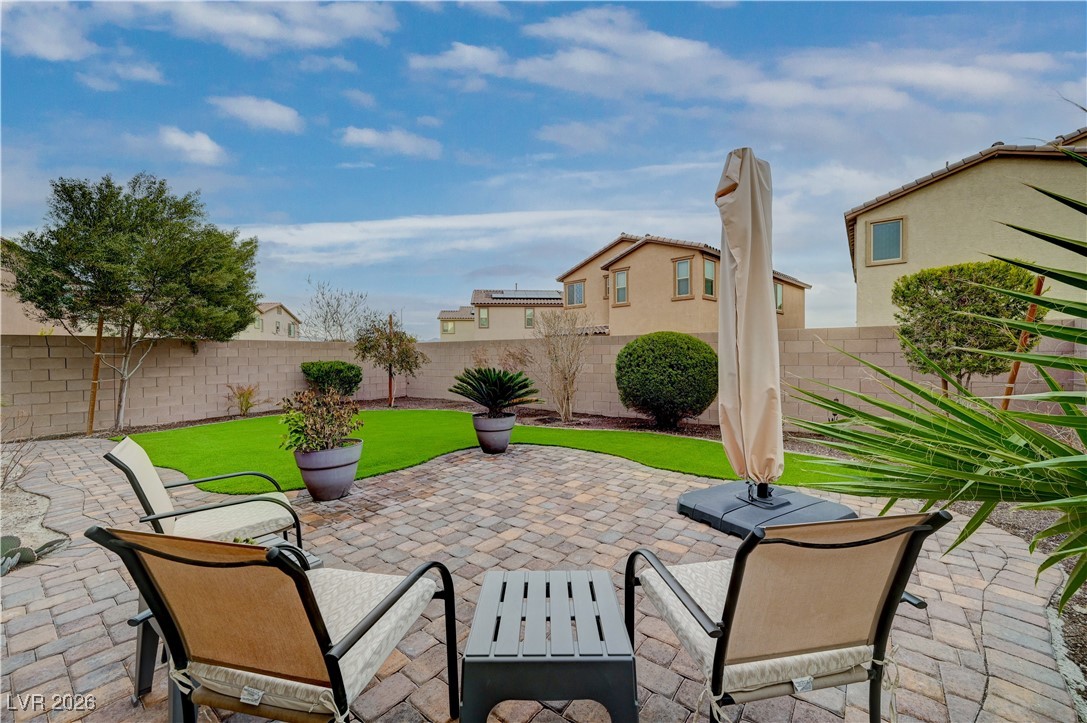 3826 Asia Road North Las Vegas, NV 89032 - Photo 29 of 30 Fenced backyard featuring a patio area