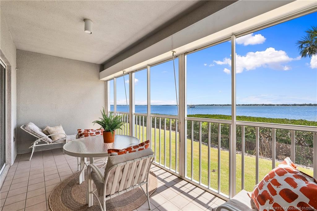 164 Northeast Edgewater Drive, Unit 2105 Jensen Beach, FL 34957 - Photo 23 of 35 a outdoor space with furniture