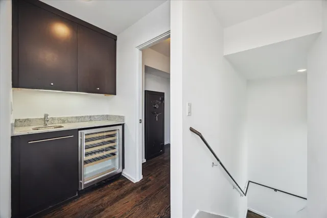 a view of a kitchen from an empty room