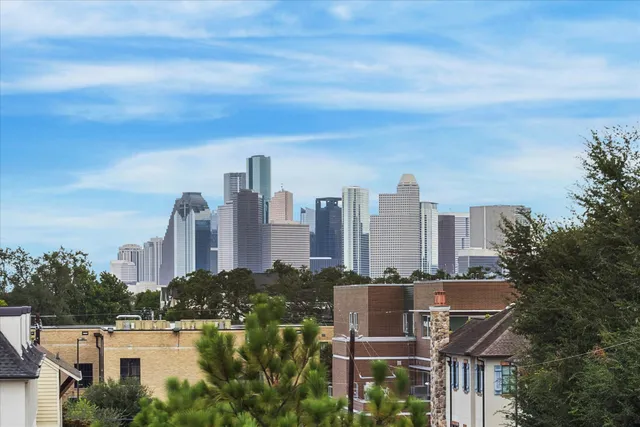 a view of a city with tall buildings