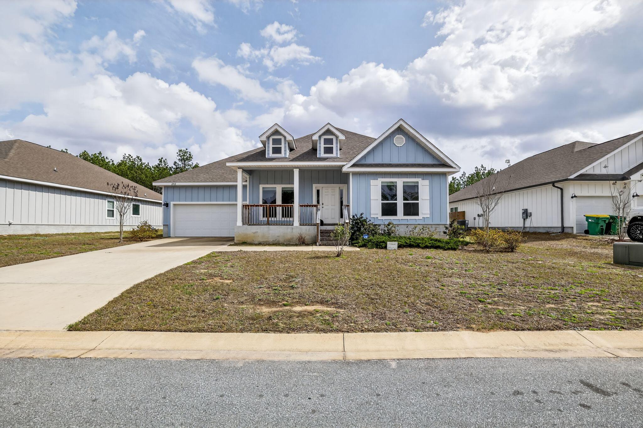 2452 Dakota Way Crestview, FL 32536 - Photo 1 of 29 a front view of a house with a yard