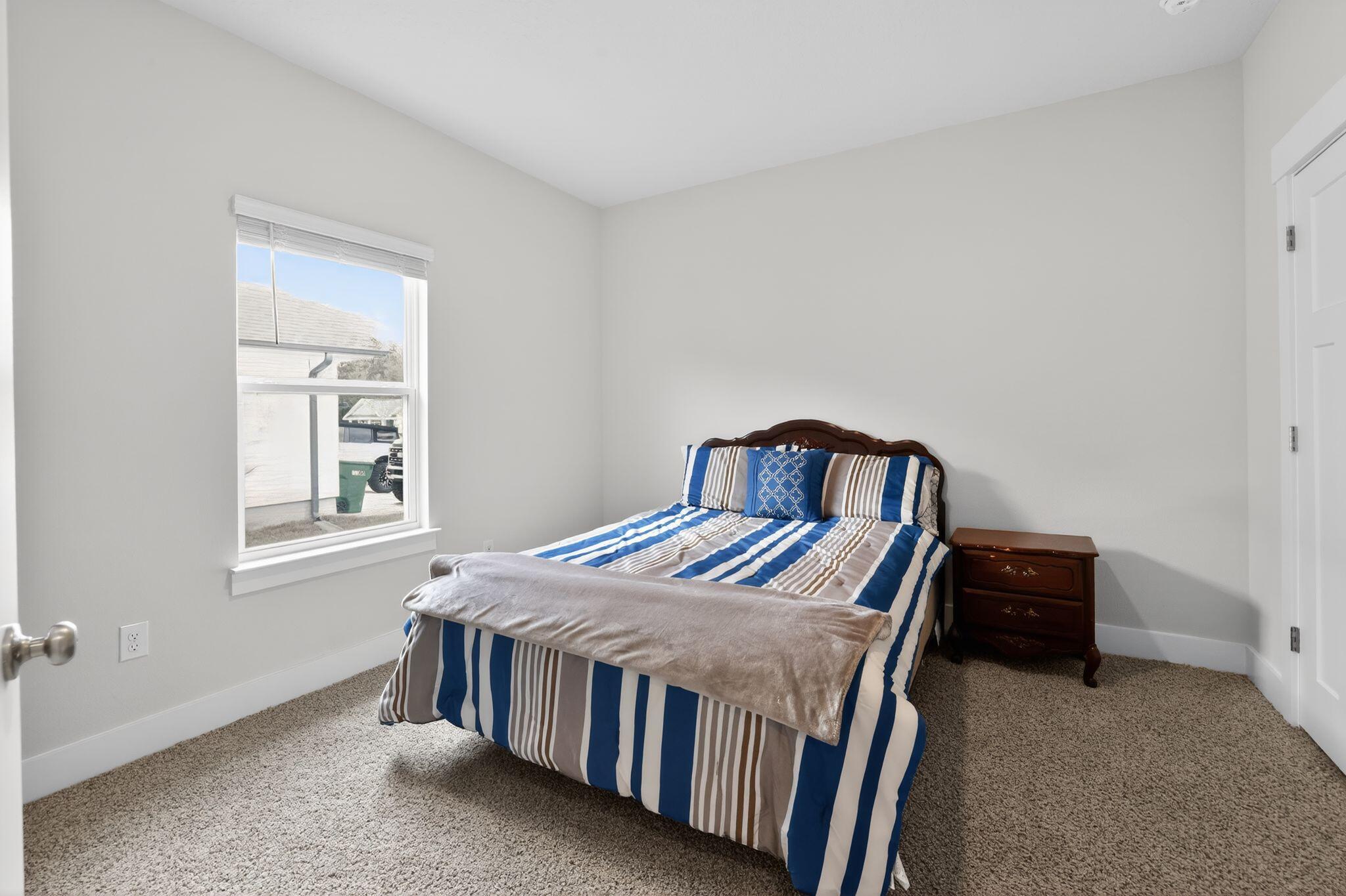 2452 Dakota Way Crestview, FL 32536 - Photo 21 of 29 a bedroom with a bed and a window
