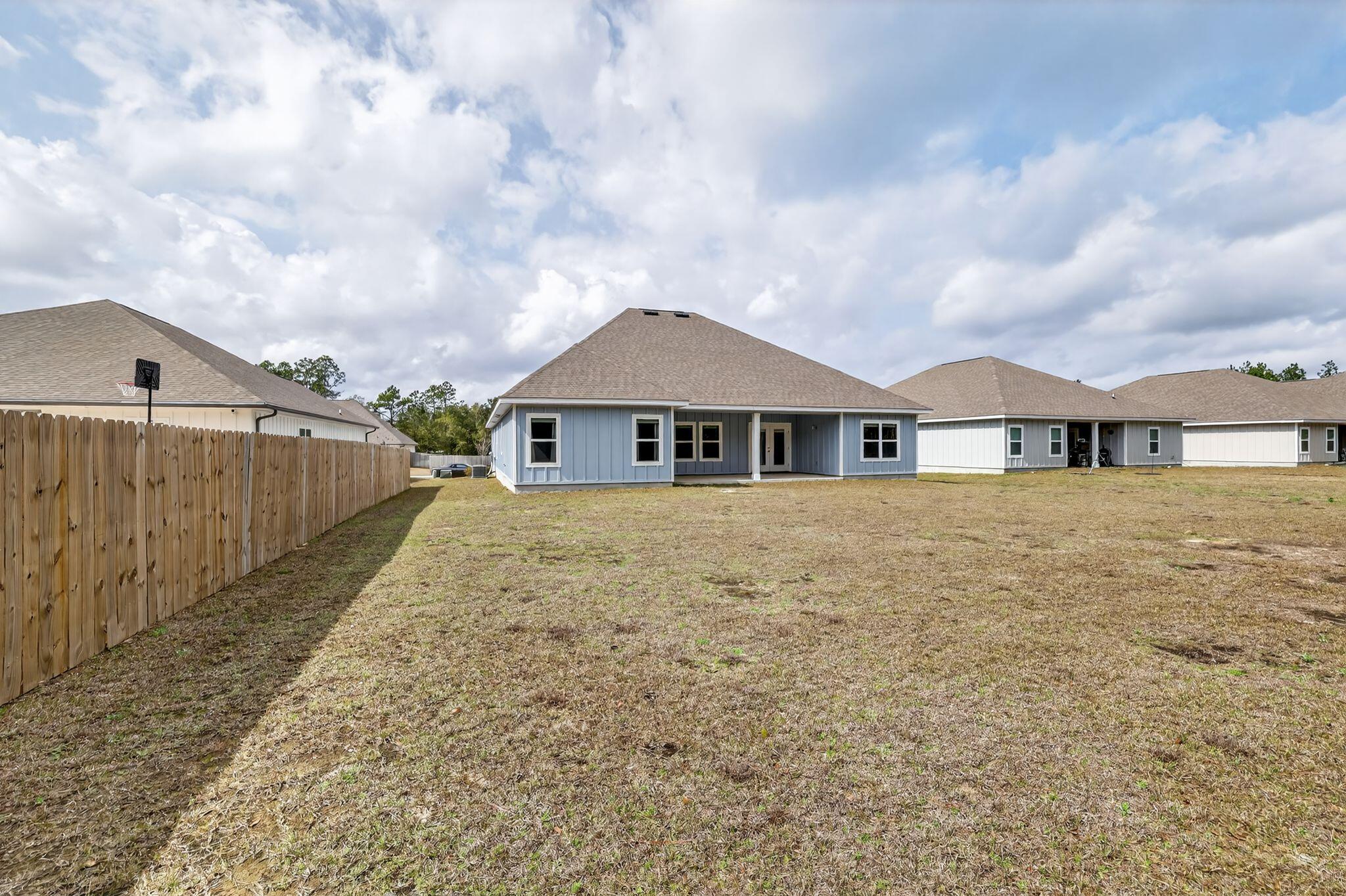 2452 Dakota Way Crestview, FL 32536 - Photo 3 of 29 a front view of a house with yard